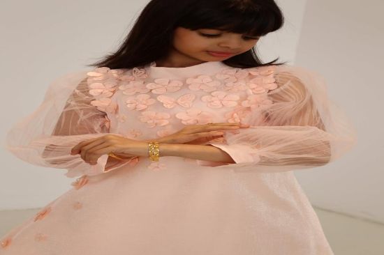 صورة فستان خربزي اكمام تل